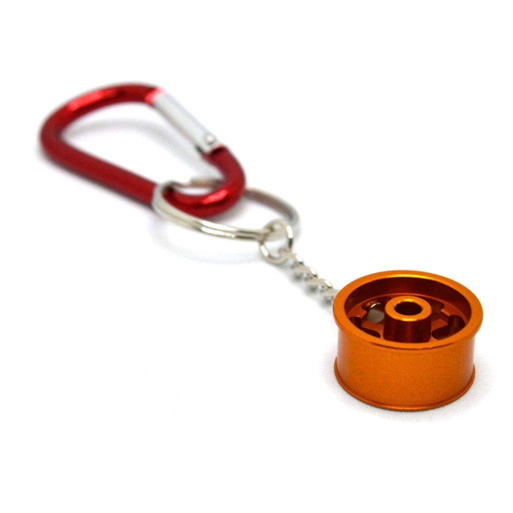 WHEEL-SHAPED DISC WITH CARABIN - ORANGE