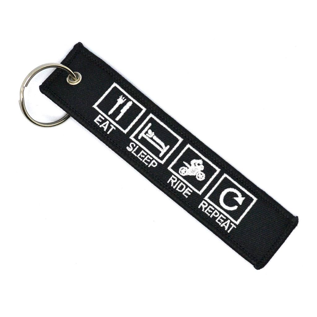 EAT SLEEP RIDE REPEAT - Keychain tag with the inscription